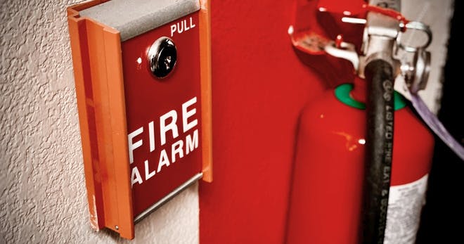 A fire alarm and fire extinguisher