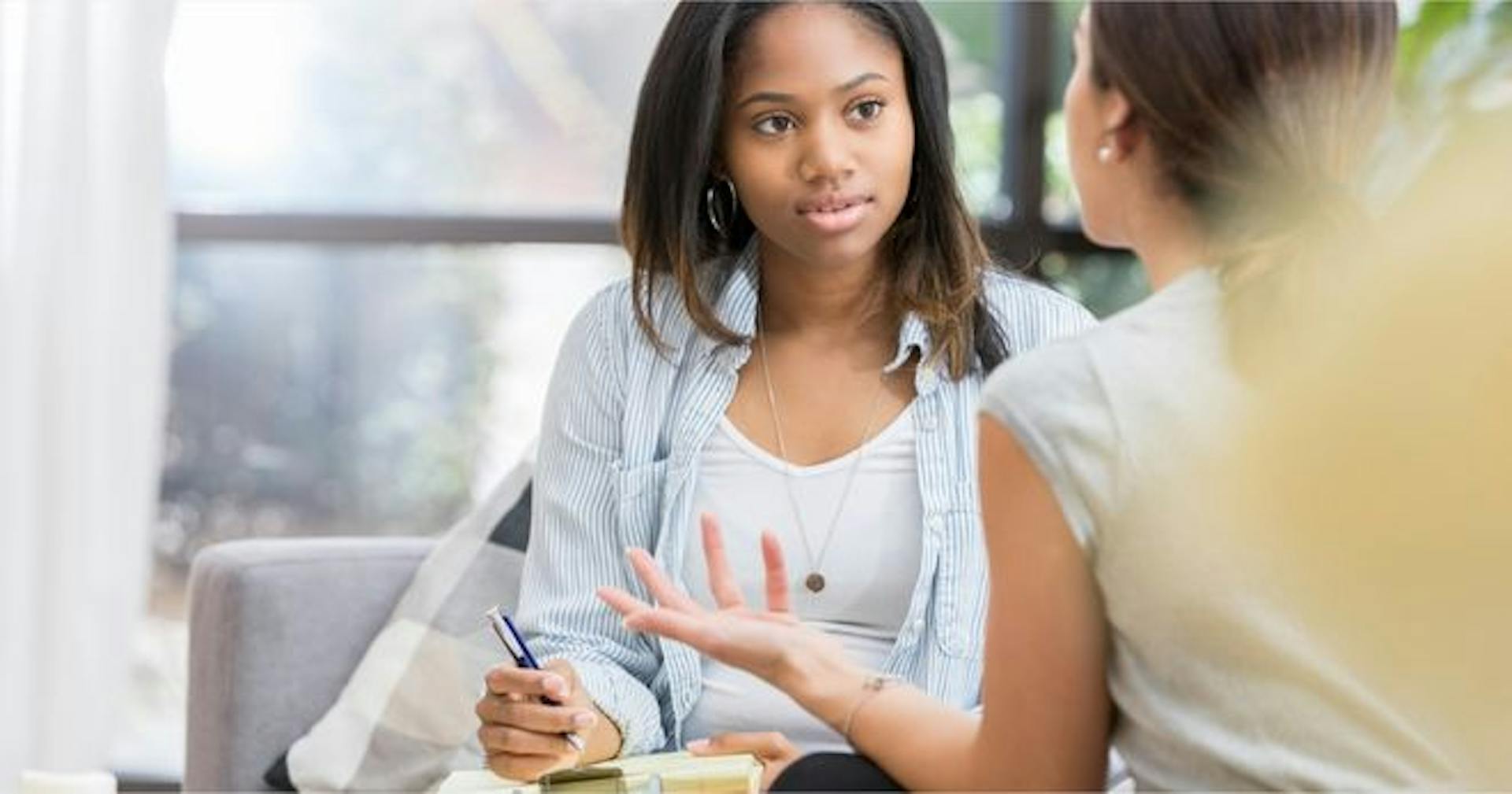 woman actively listening to another woman