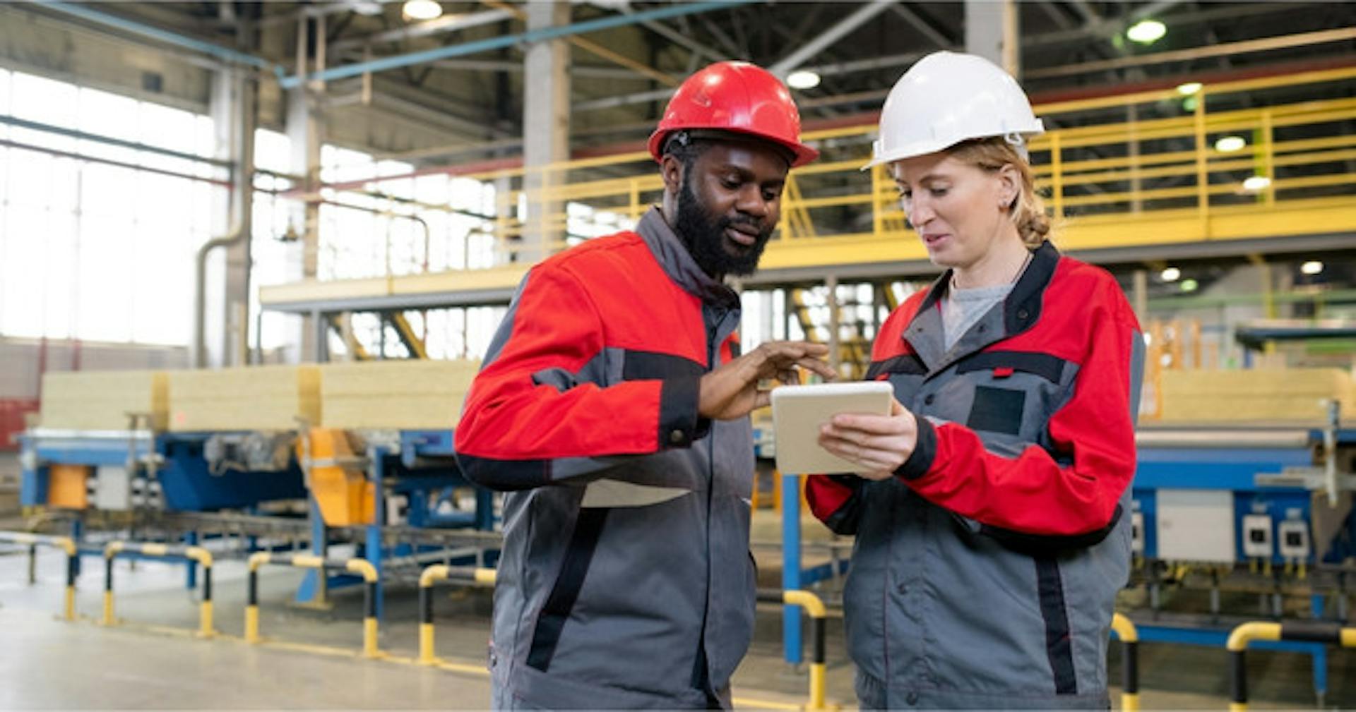 Workers discussing a task