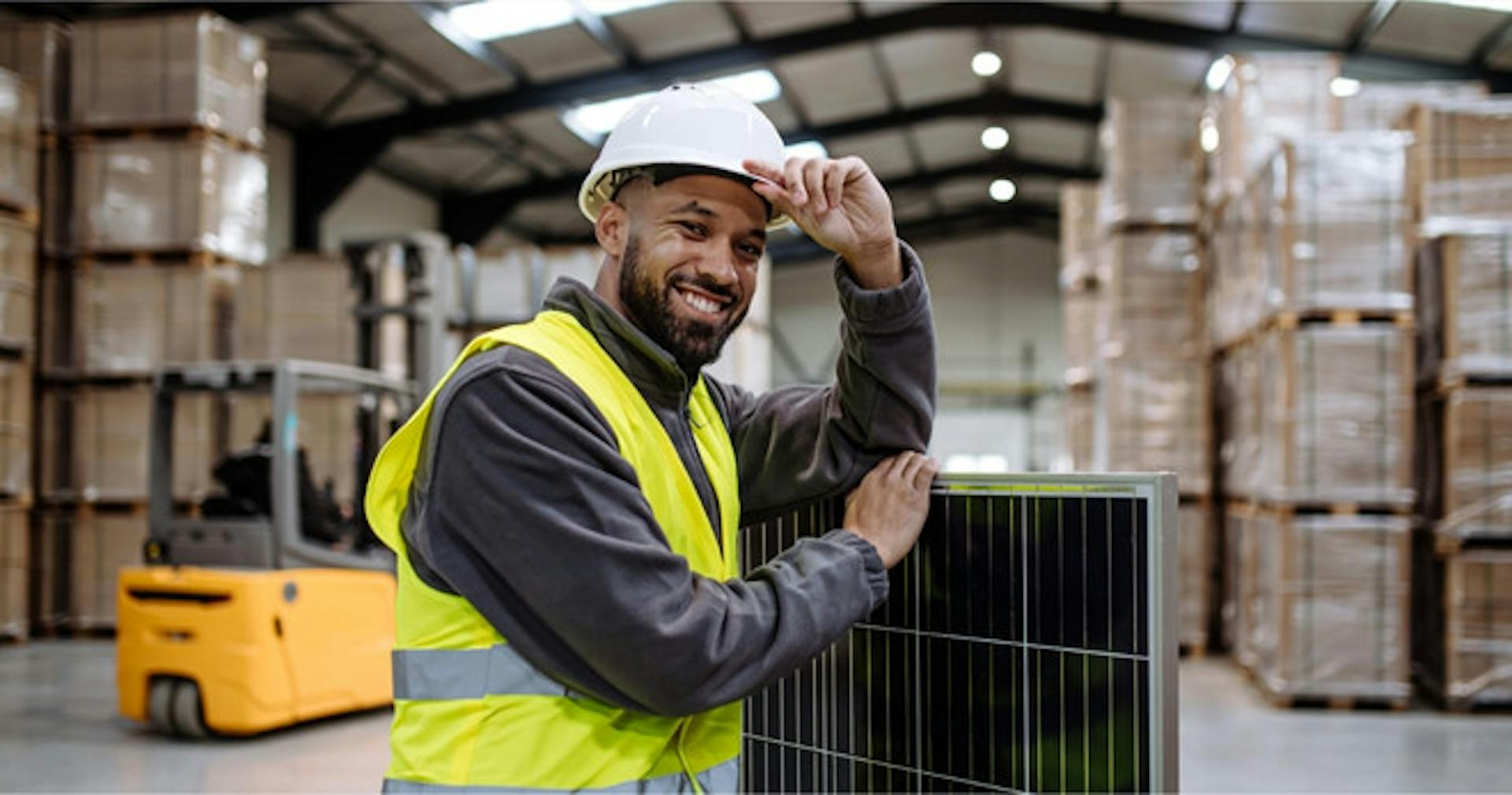 Man wearing safety vest and hard hat