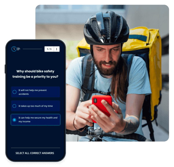 A delivery person on a bike taking an SC Training (formerly EdApp) course on their phone