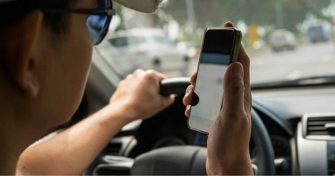 Safe driving tip - Avoid using mobile phones