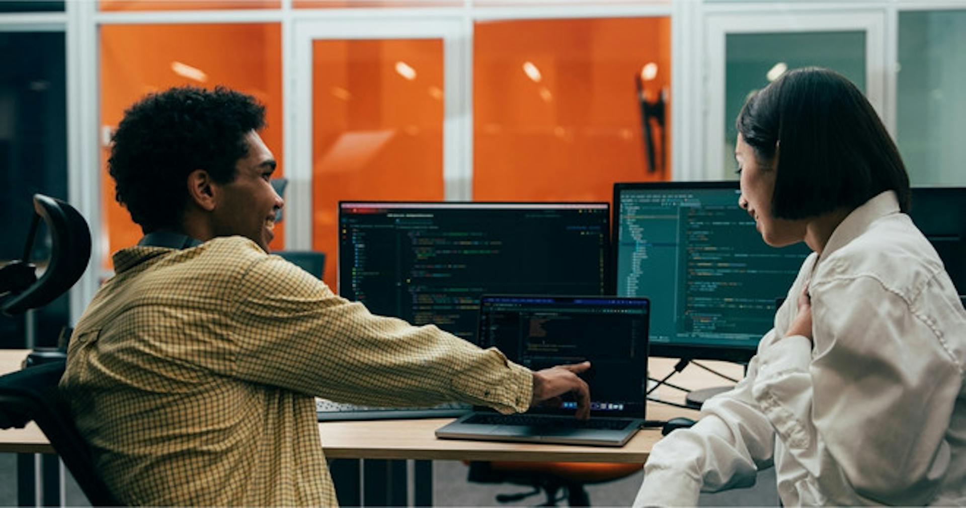 Teammates enjoying a hackathon