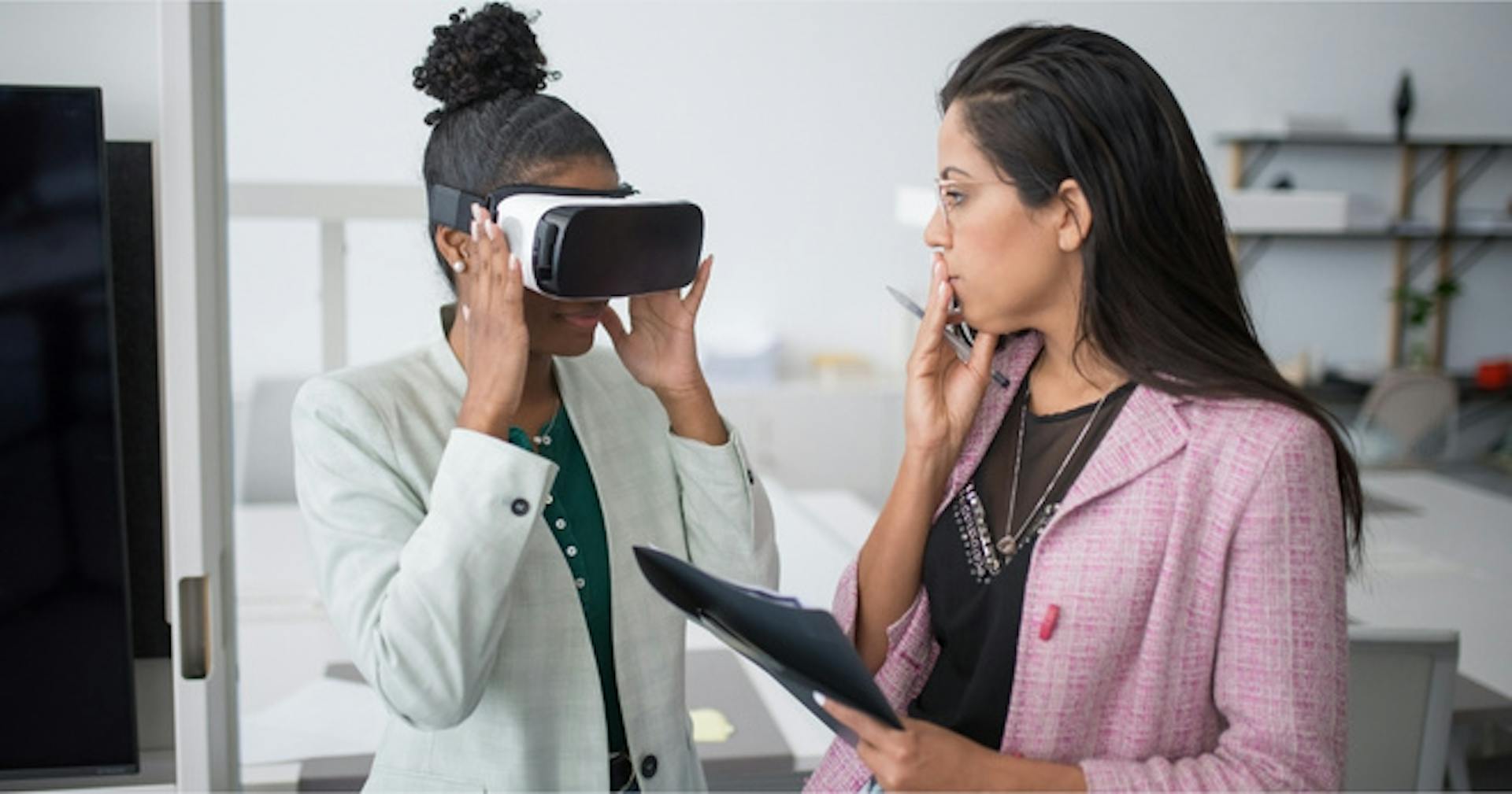 Supervisor facilitating VR skill training