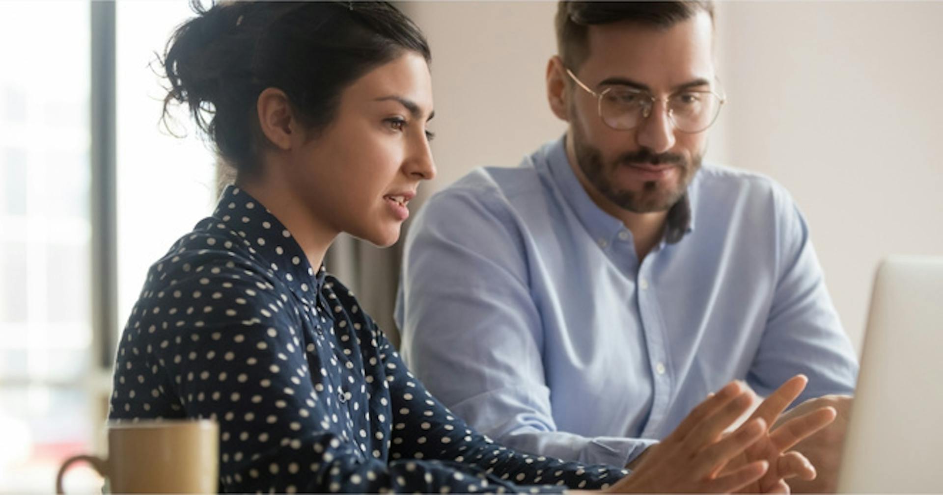 Team leader mentoring an employee