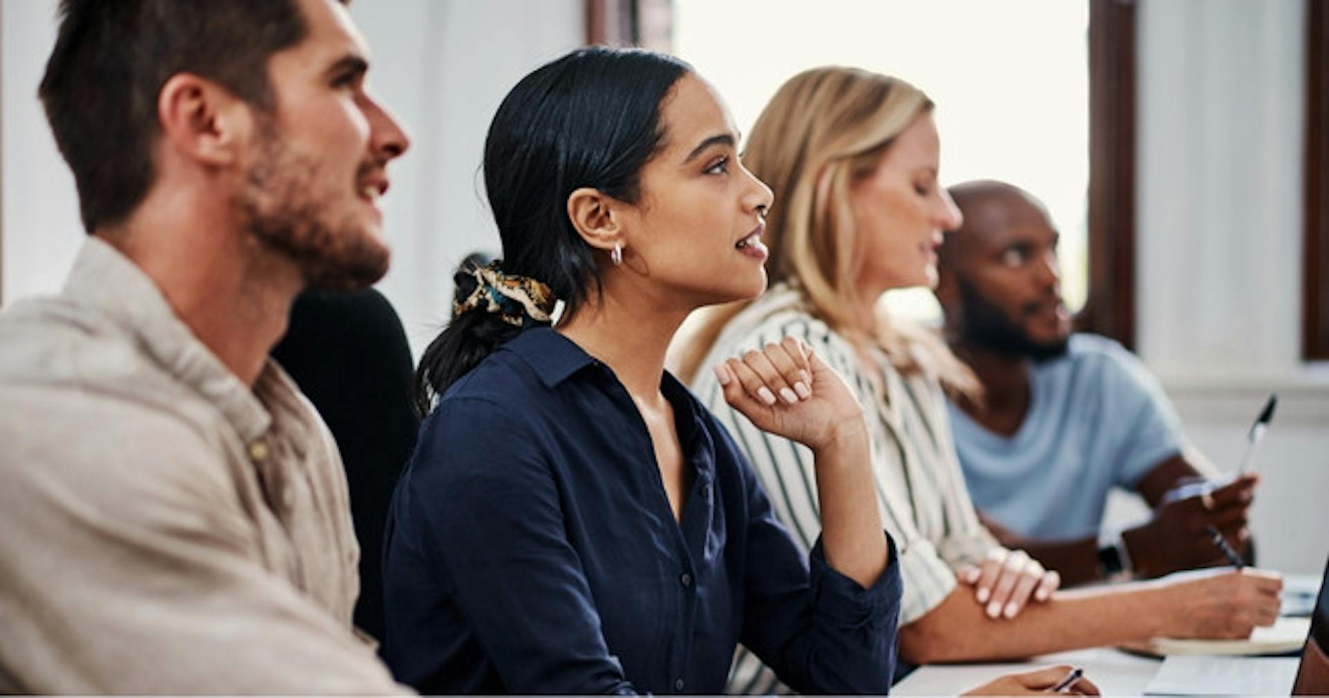 Employees trying active listening exercises as a communication training activity