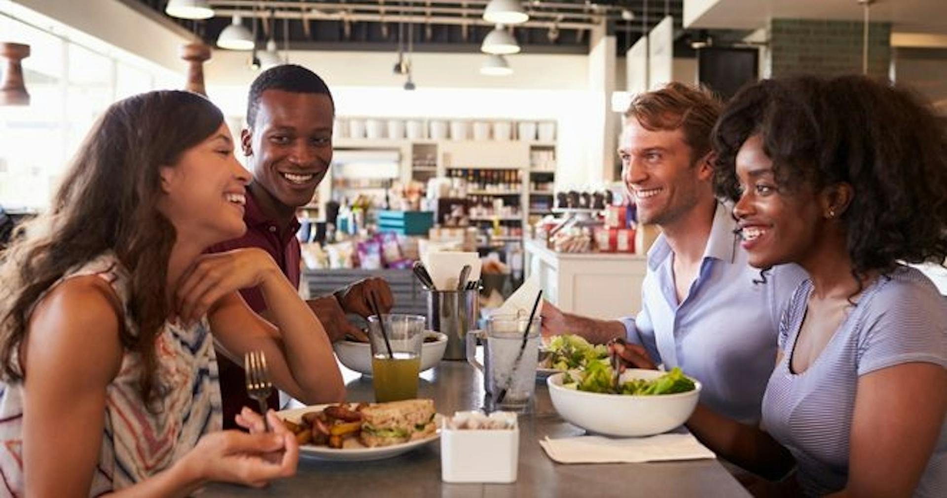 Employees talking over lunch