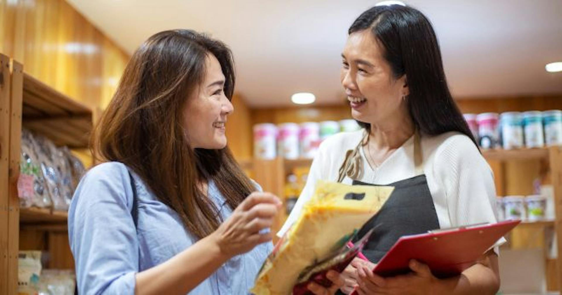 retail employee helping a customer