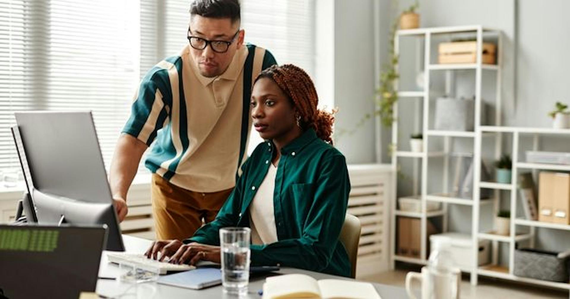Two employees undergoing change management training