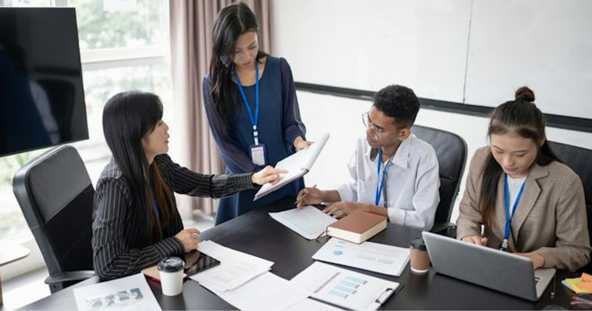 Mentor giving a new hire training