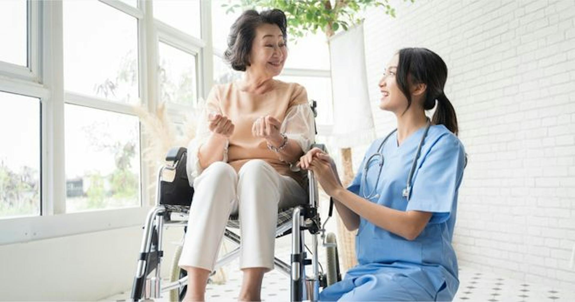 Female caregiver effectively communicating with patient