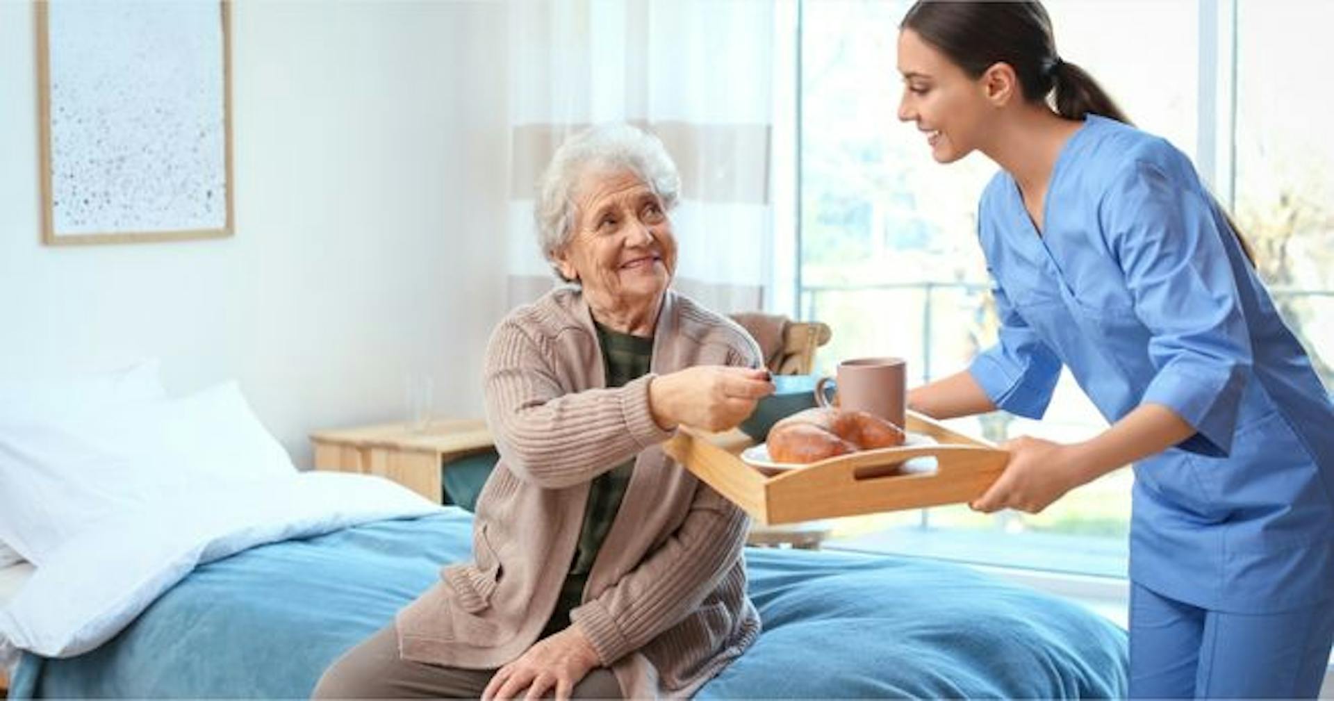 Caregiver using nutritional knowledge to feed patient
