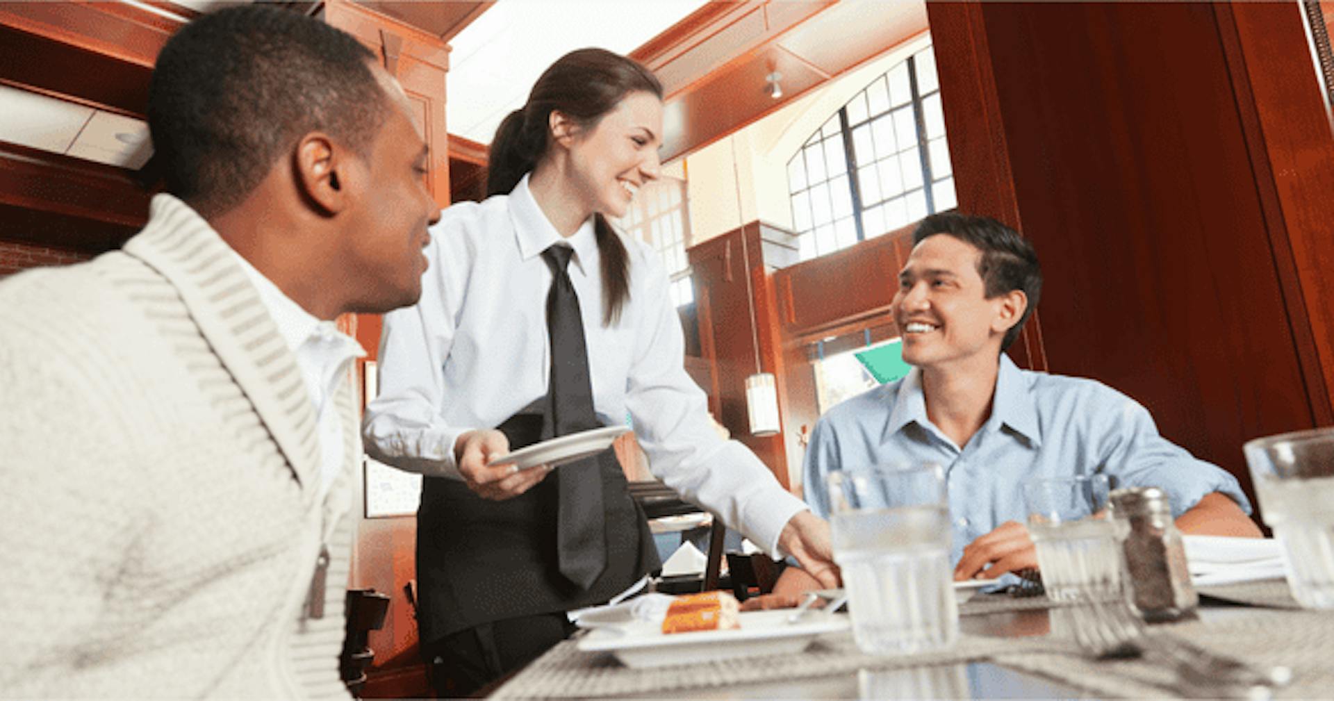 waitress-serving-guests-in-a-restaurant