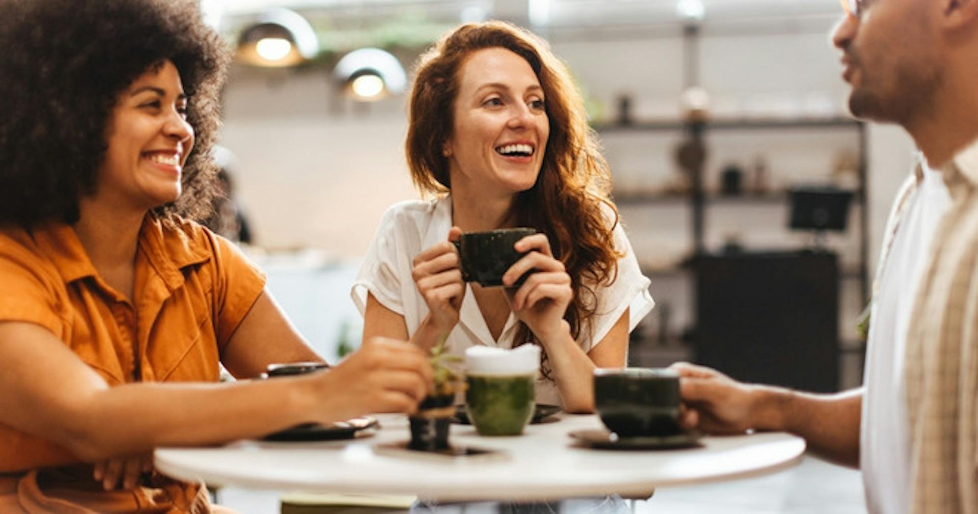 Team members having coffee together during break