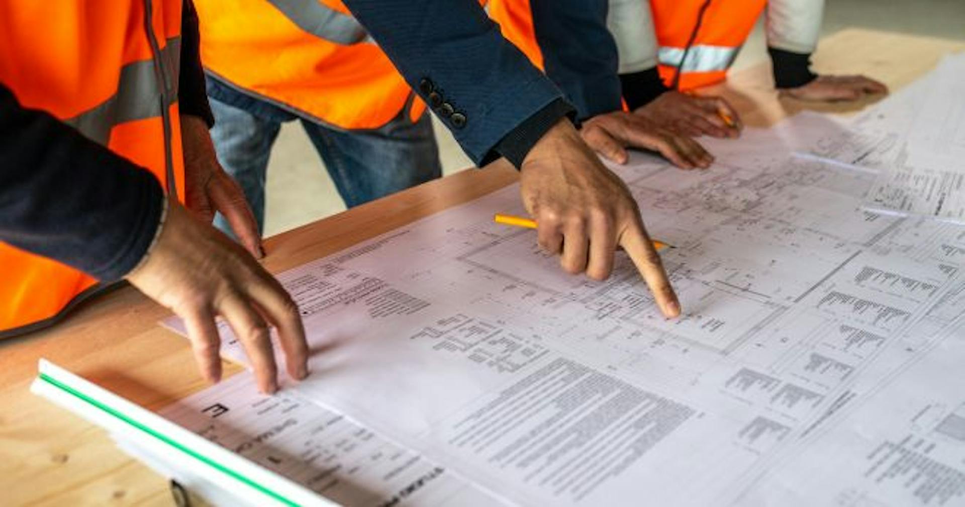 Employees discussing the emergency plan