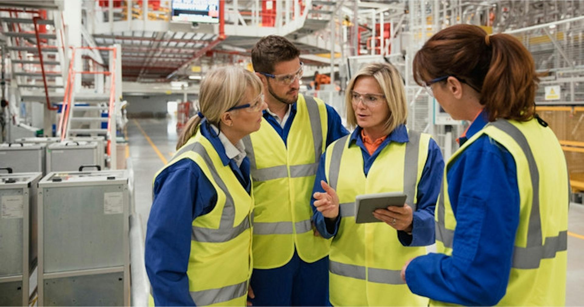 Employees conducting manufacturing training