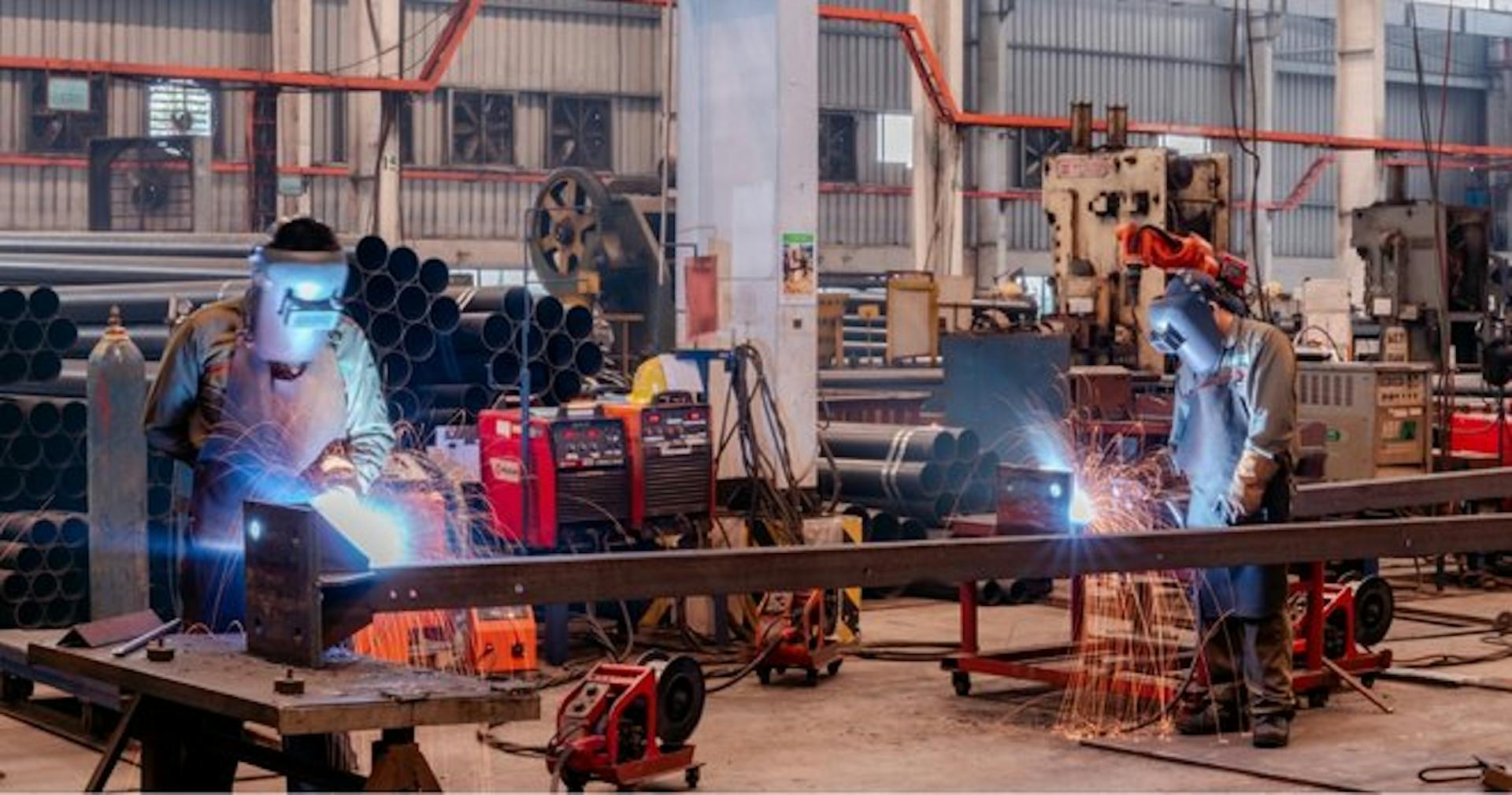 Steel workers doing assembly and fabrication work