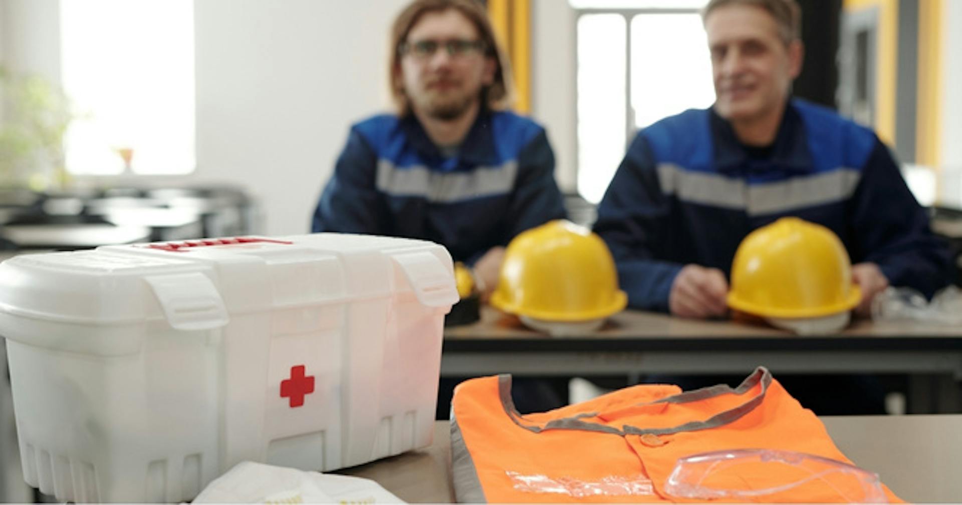 Frontline employees assessing their emergency and first aid kit