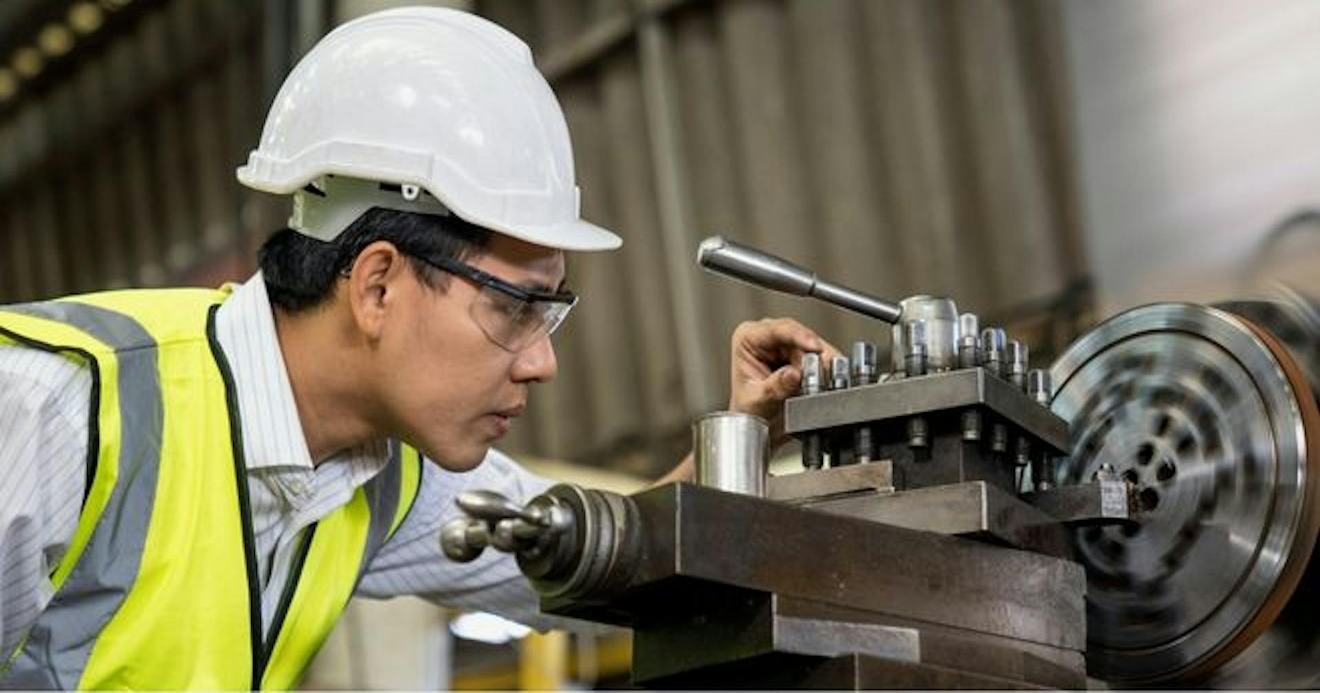 Worker conducting inspection wearing PPE