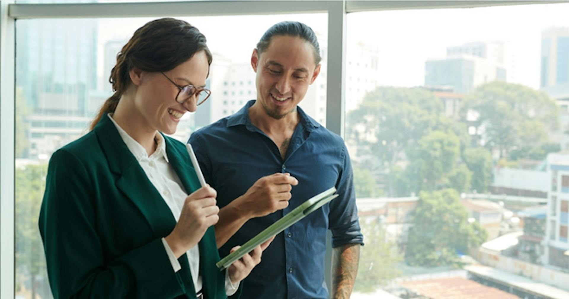 Employees reading a digital infographic