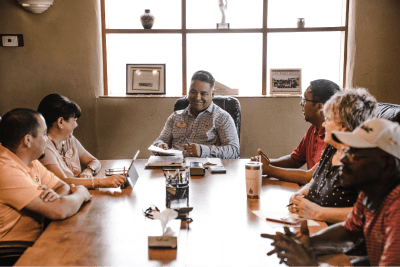 Meeting table of diverse people