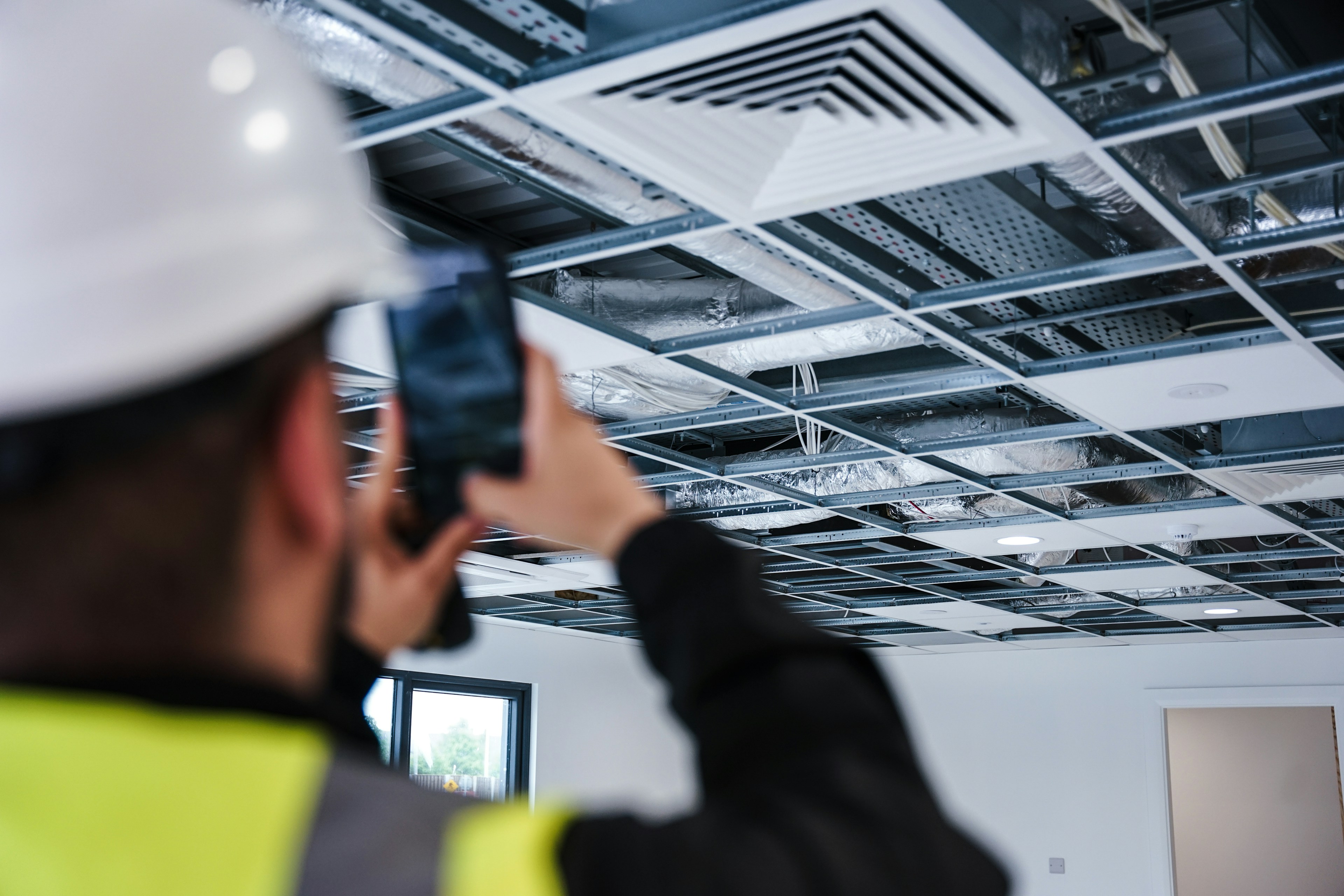 engineer taking a photo on site