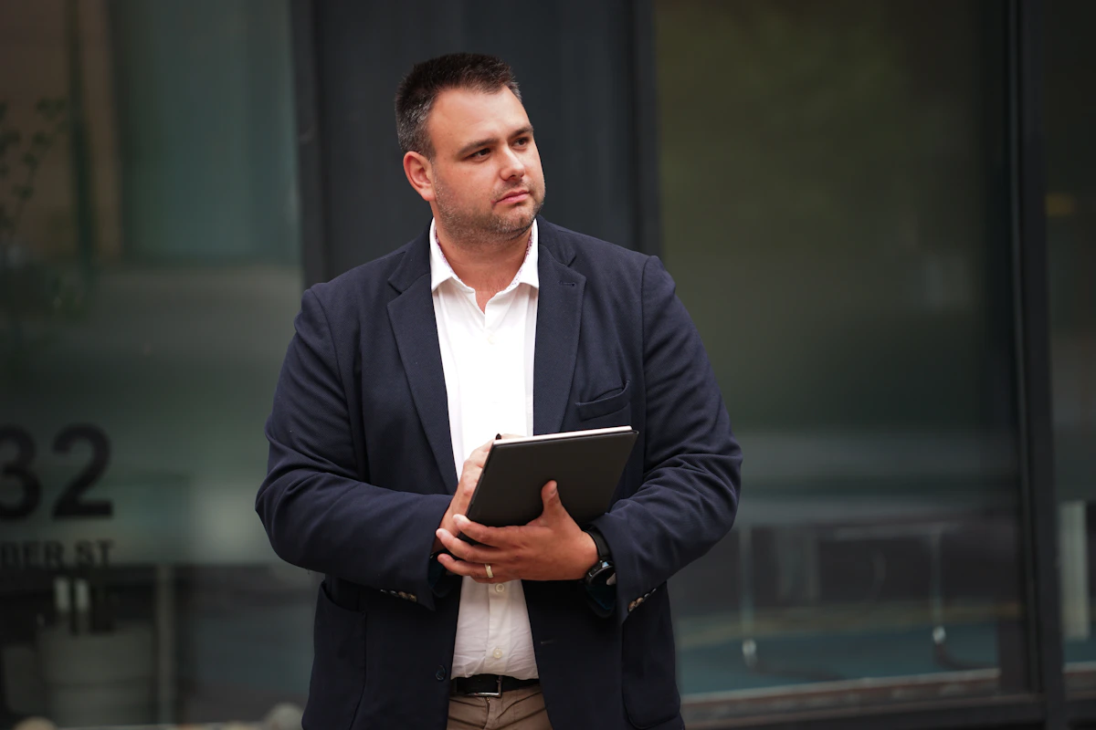 engineer on site taking notes