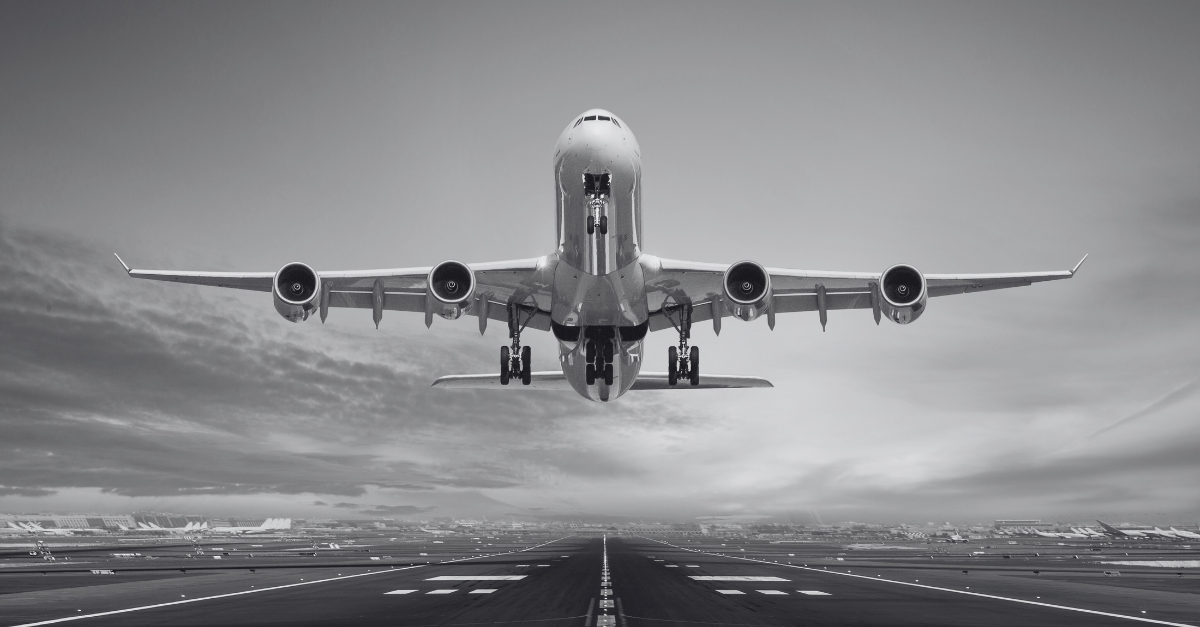 A passenger plane takes off from the runways of an airport.