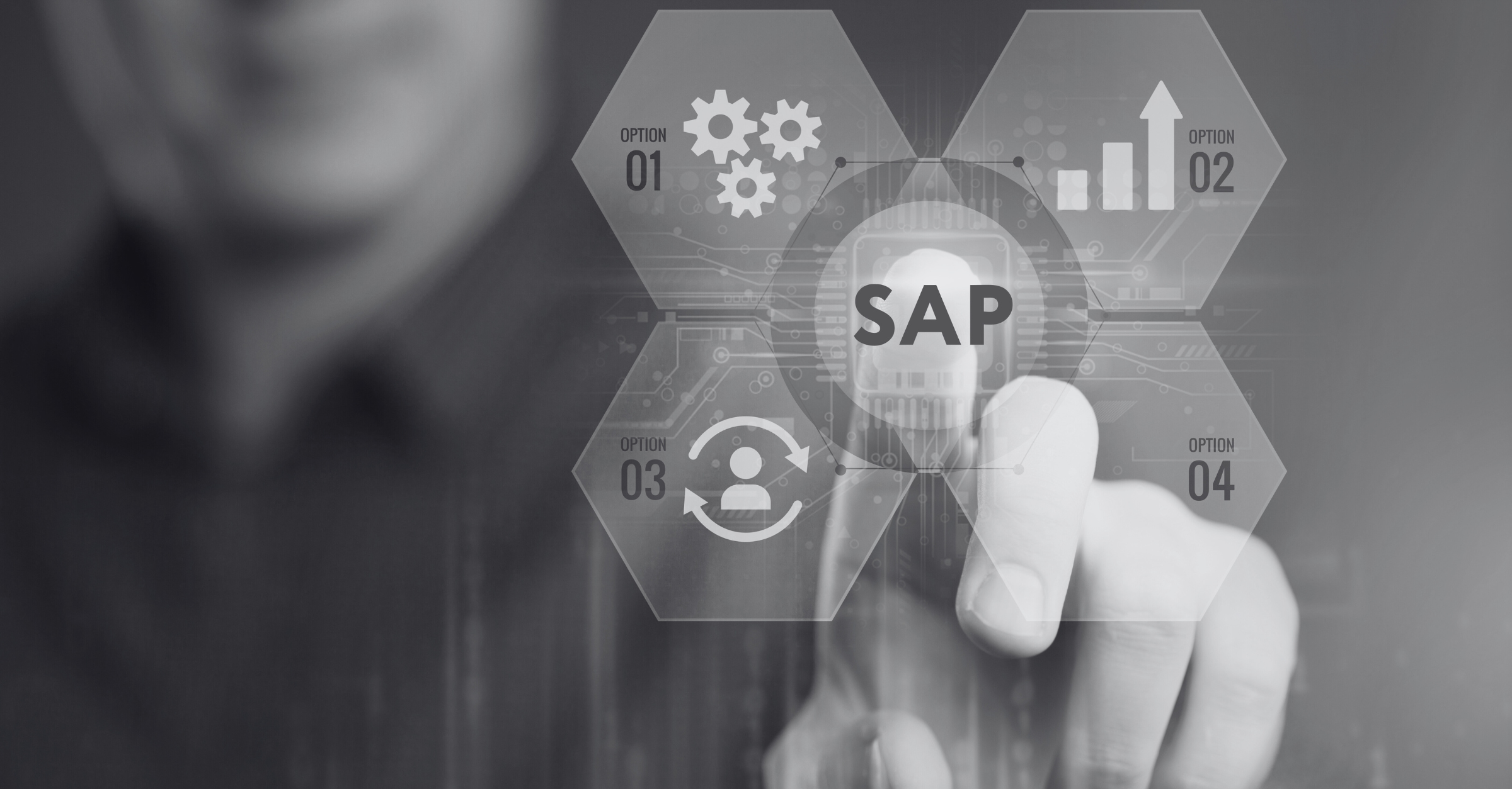 A person is pointing at a virtual touchscreen labeled "SAP" in the center. The word "SAP" is surrounded by four hexagonal icons: a gear, a growth chart, an arrow-bearing user icon, and a fourth option with an unspecified symbol.
