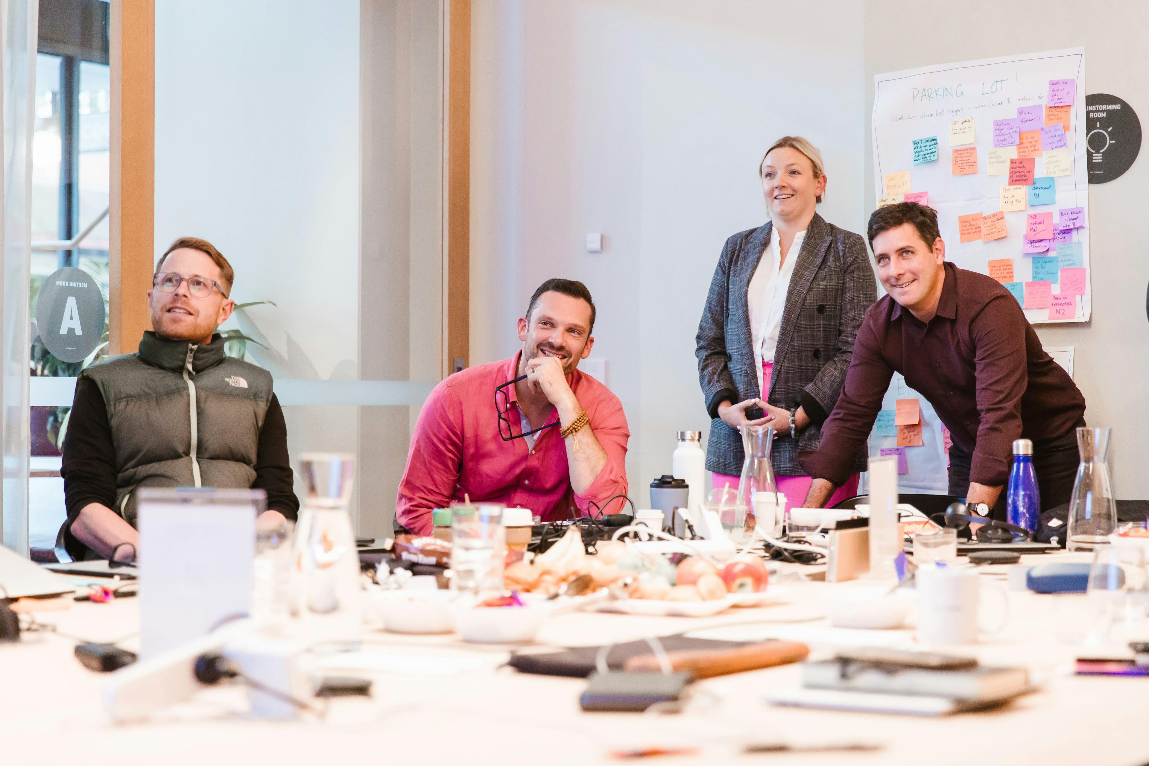 Group of people conducting a strategy session to help their organisation identify the areas of their supply chain that are at risk of modern slavery.