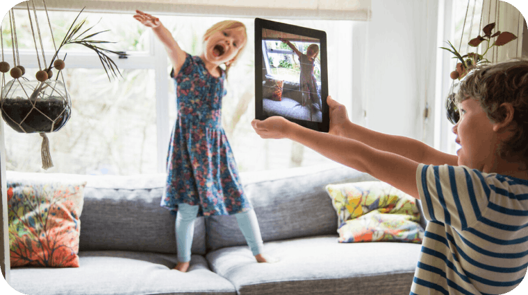 Children playing with a tablet device