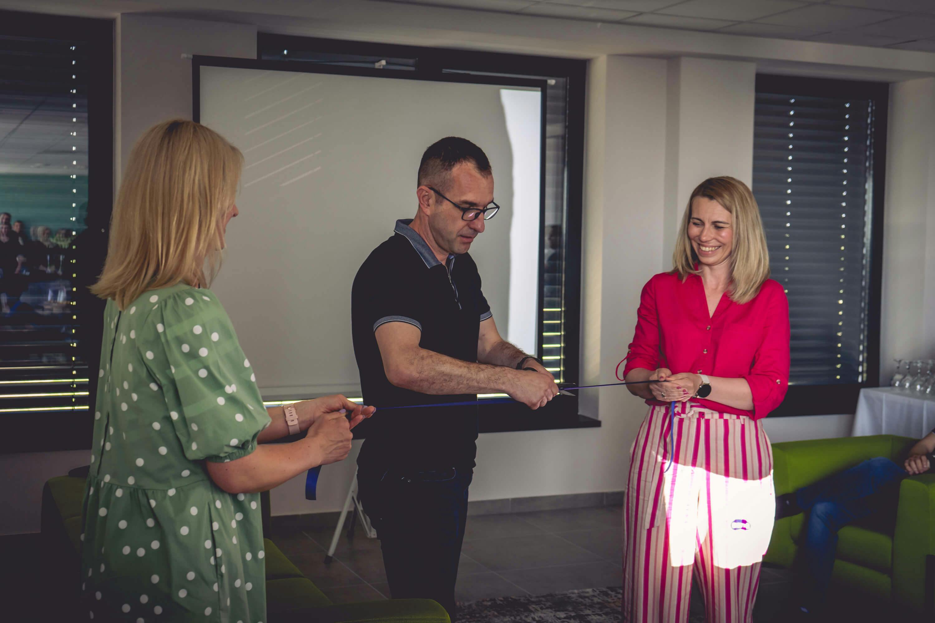Nikola Novakovic cutting the ribbon on official Emil Frey Digital new HQ opening