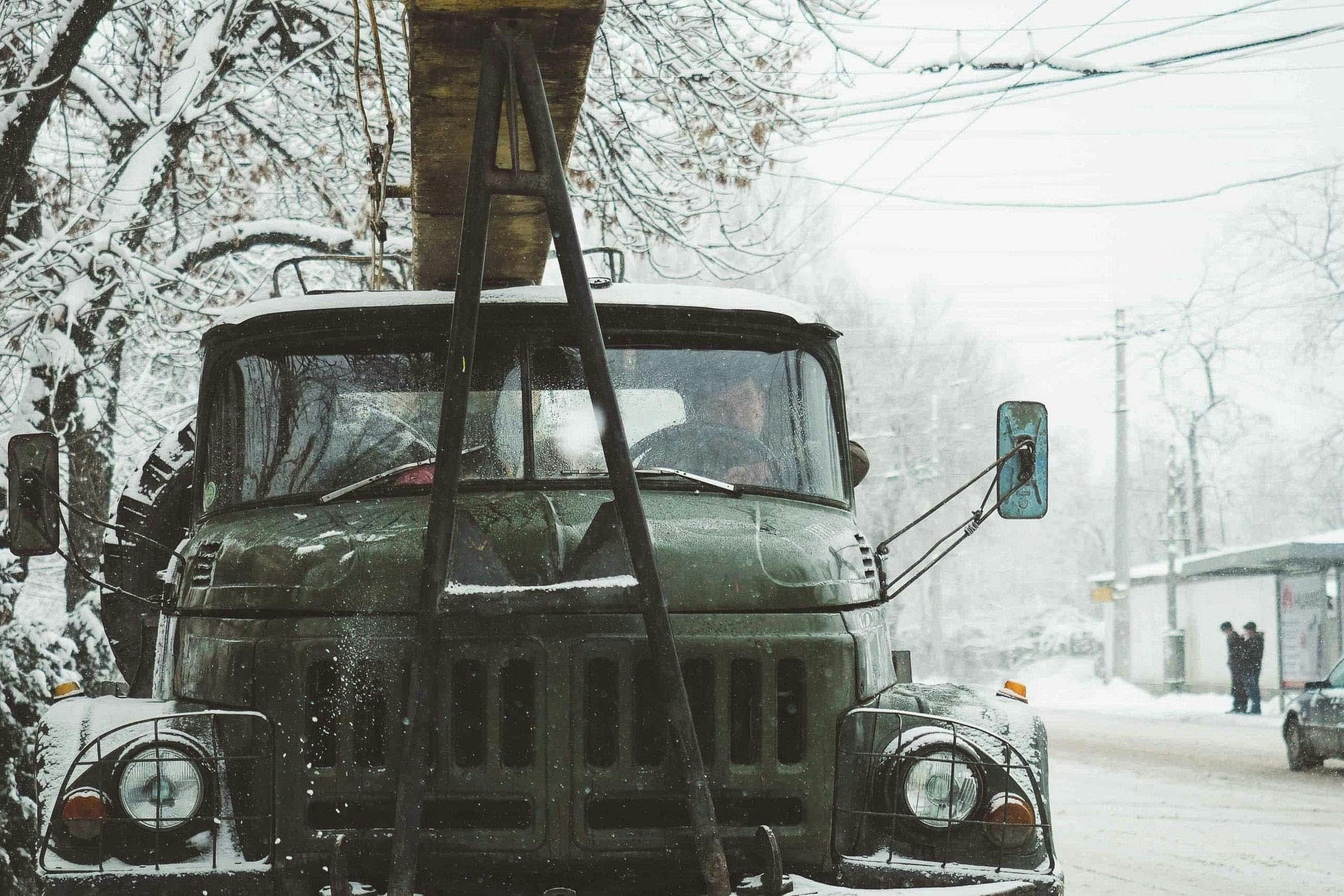 Green truck in the winter