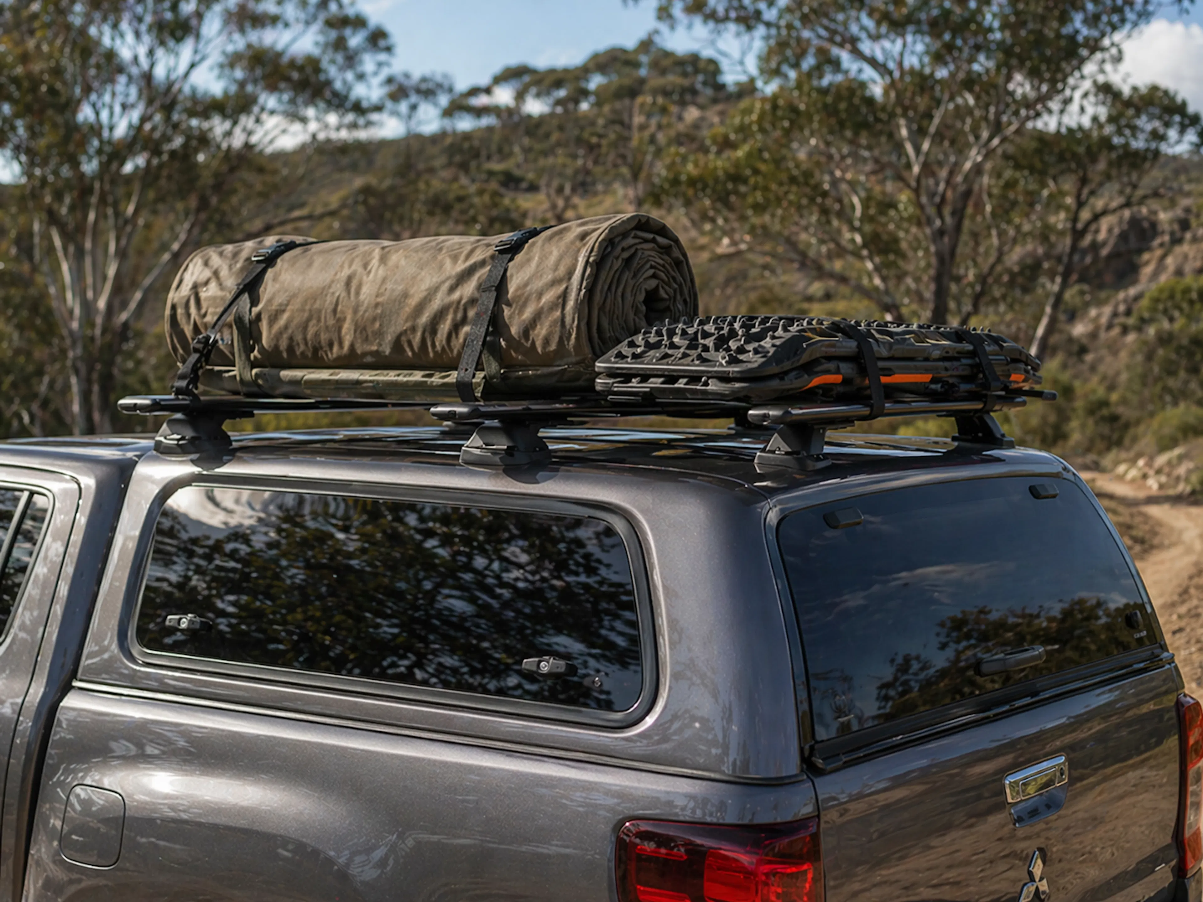 Canopy roof racks are best suited to light, evenly distributed touring gear.