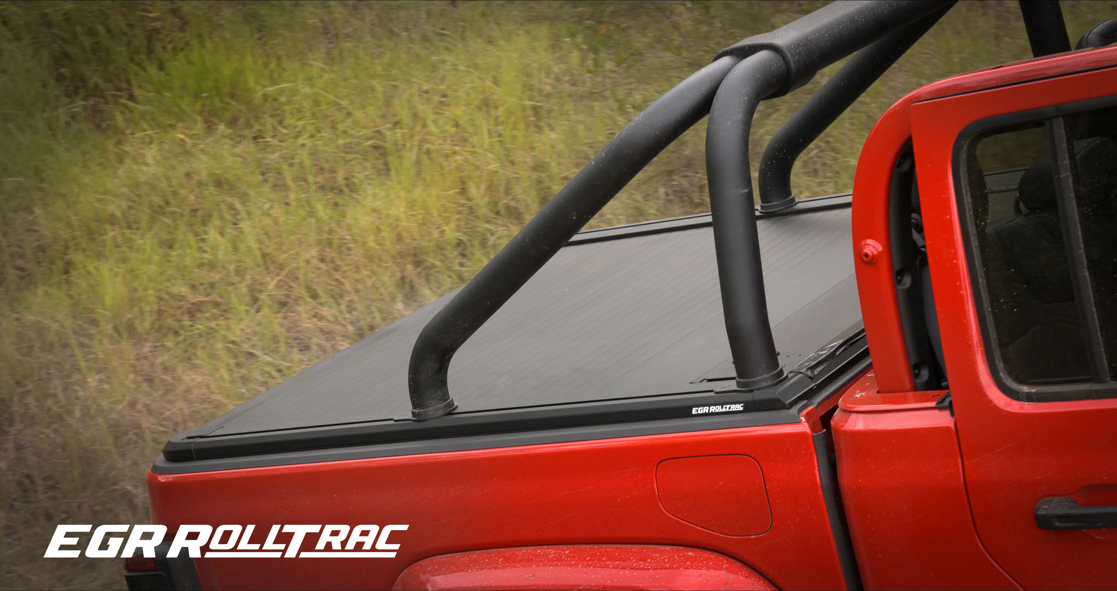 EGR RollTrac roller tonneau cover installed on a red ute with sports bar
