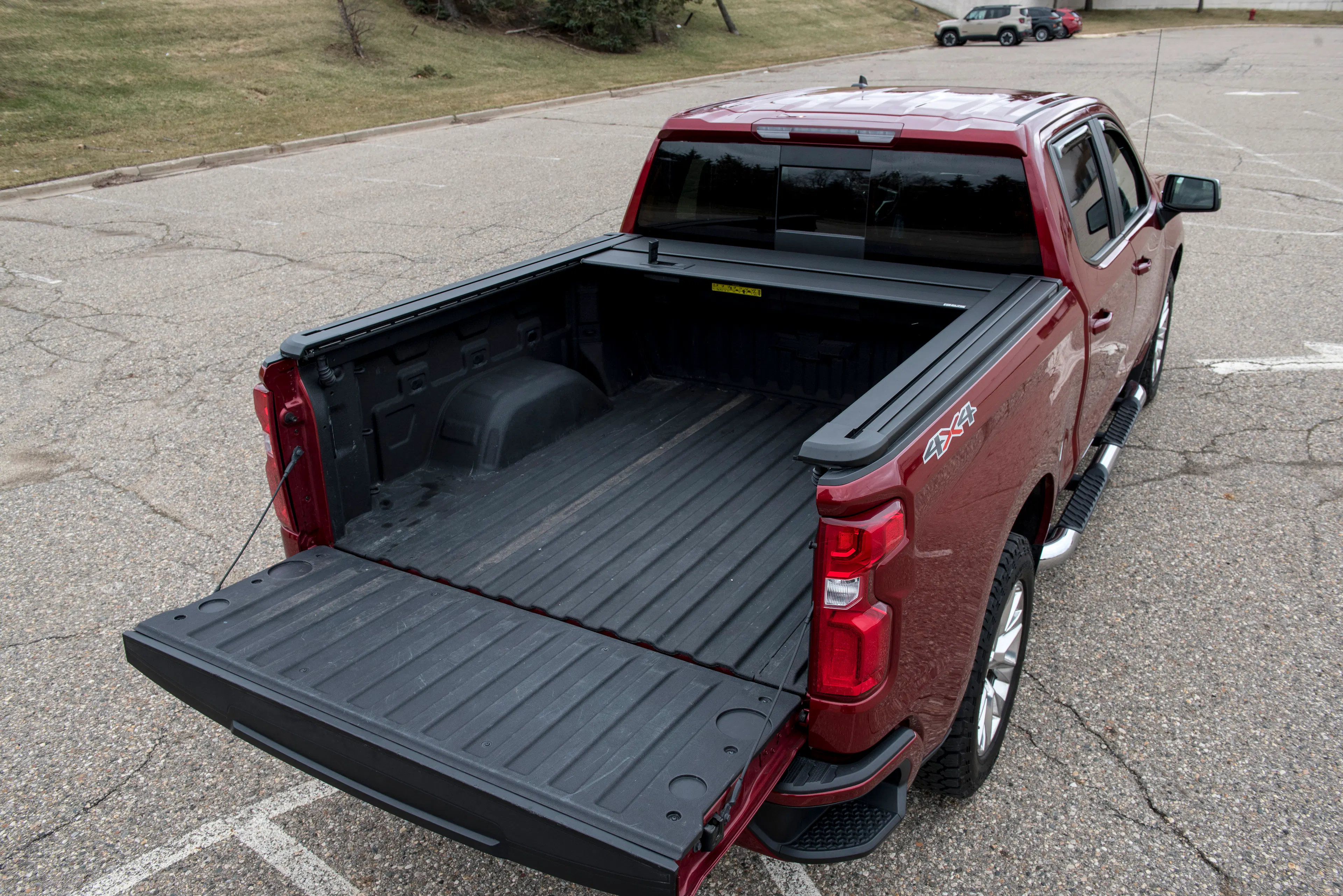 EGR RollTrac fitted to a red Chevrolet Silverado Ute with the tub open
