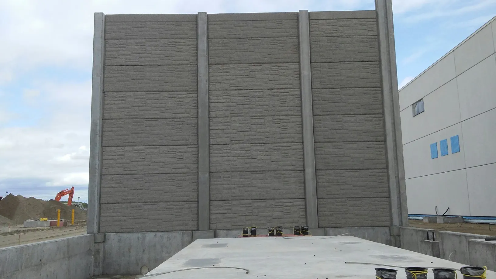 Dual-Purpose Fire and Noise Barriers at Station Marcotte