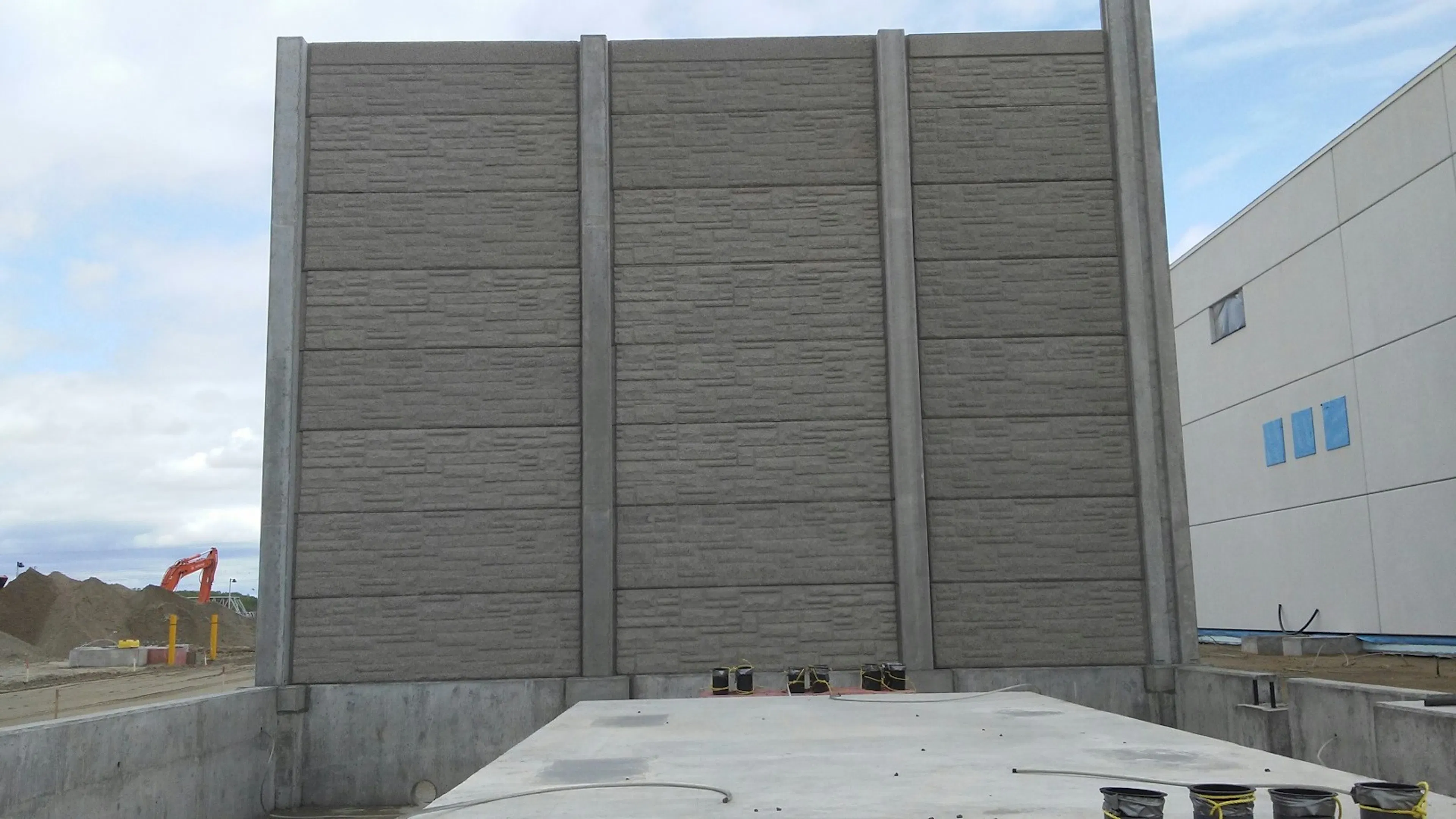 Dual-Purpose Fire and Noise Barriers at Station Marcotte