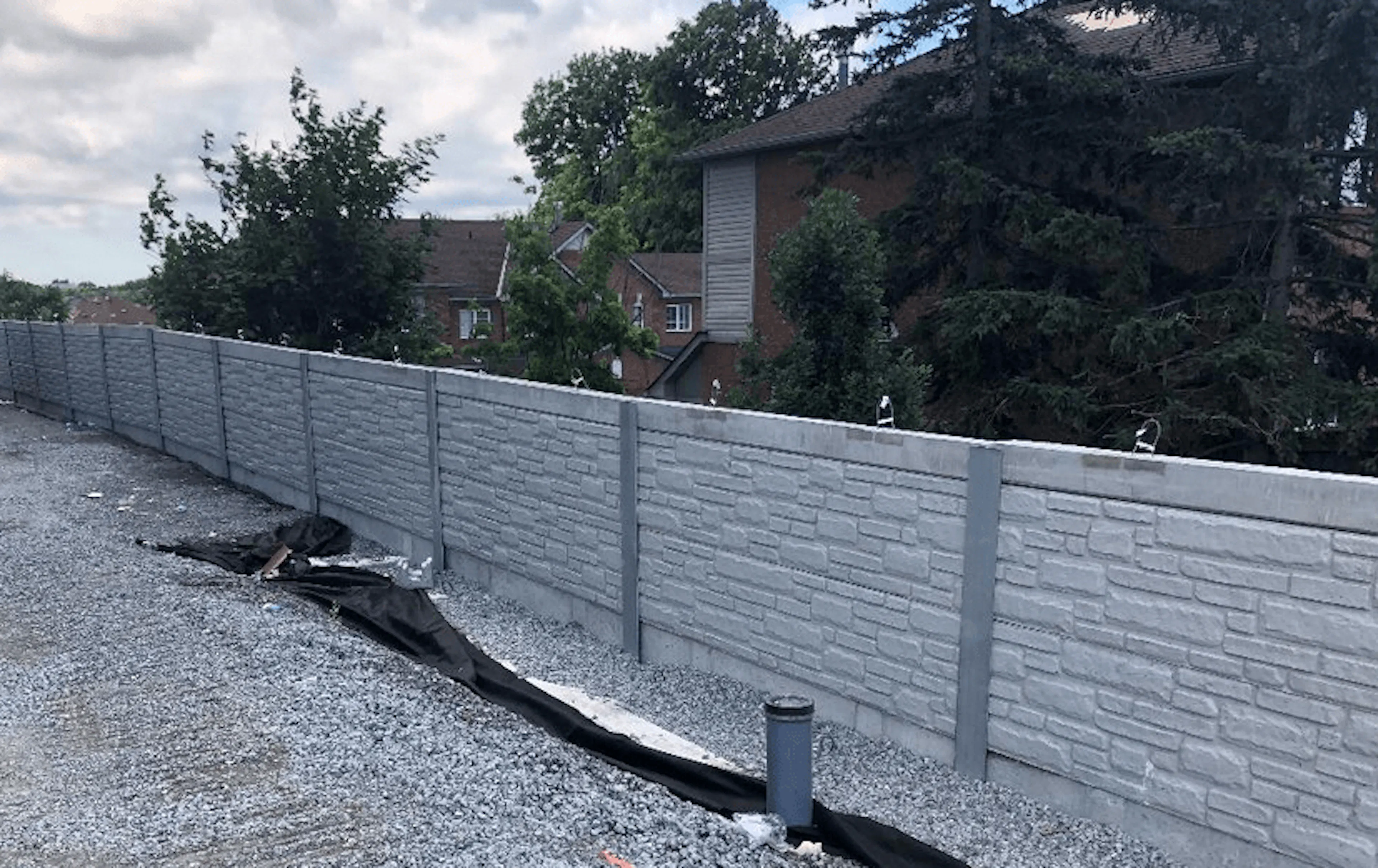 Senior Living Tower Gets Integrated Retaining Wall Solution