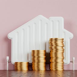 Les prix de l'énergie symbolisés par une maison en radiateur et de l'argent