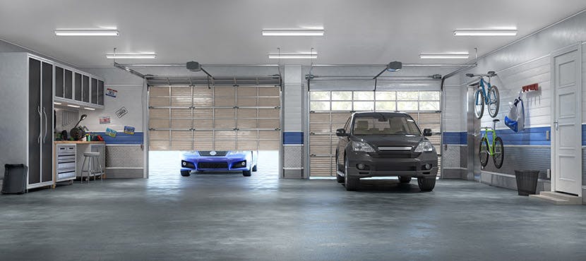 Un garage avec deux voitures