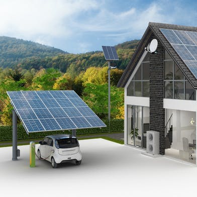 Carport solaire et maison avec des panneaux photovoltaïques