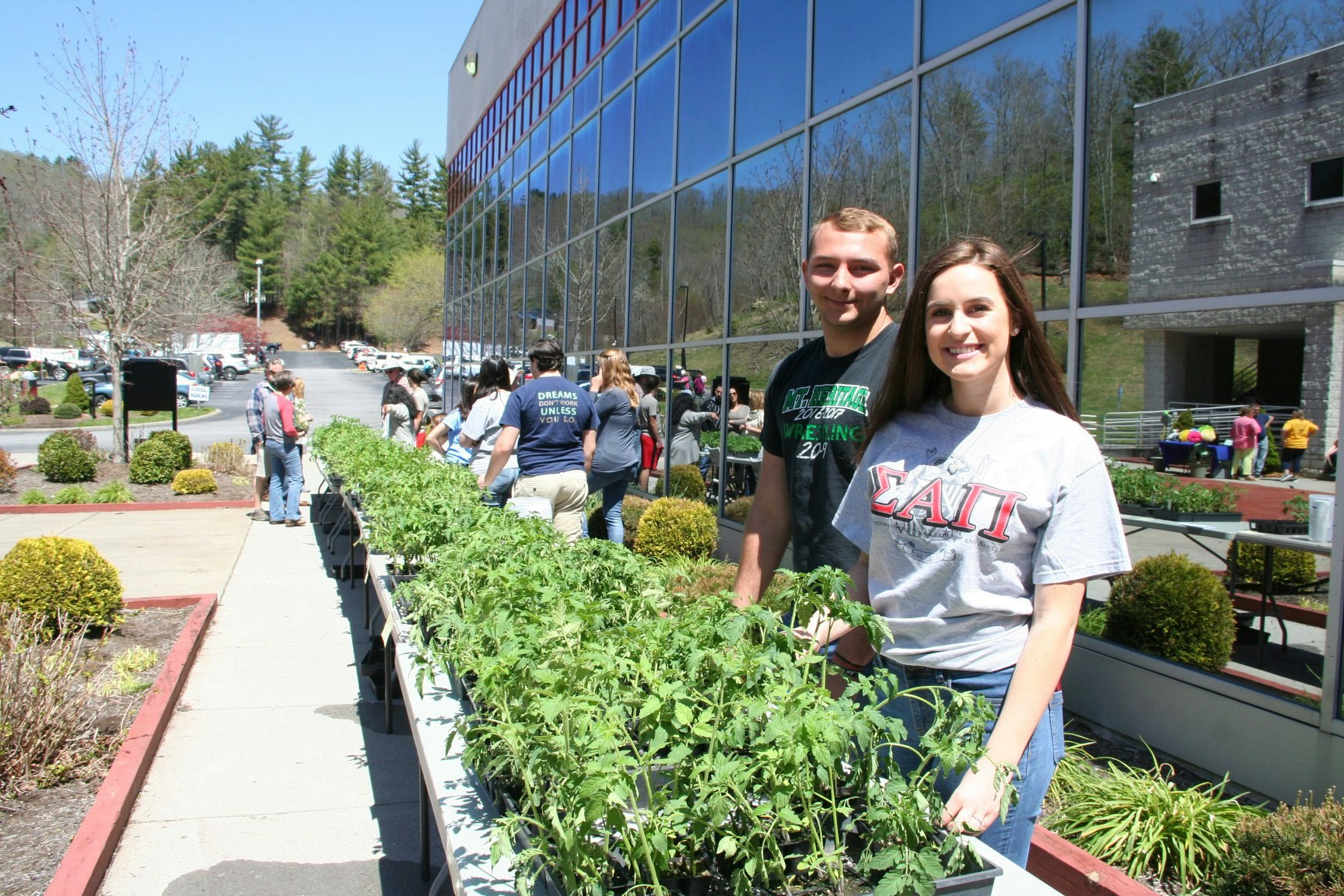 Two students at Mayland Community College attend the plant swap