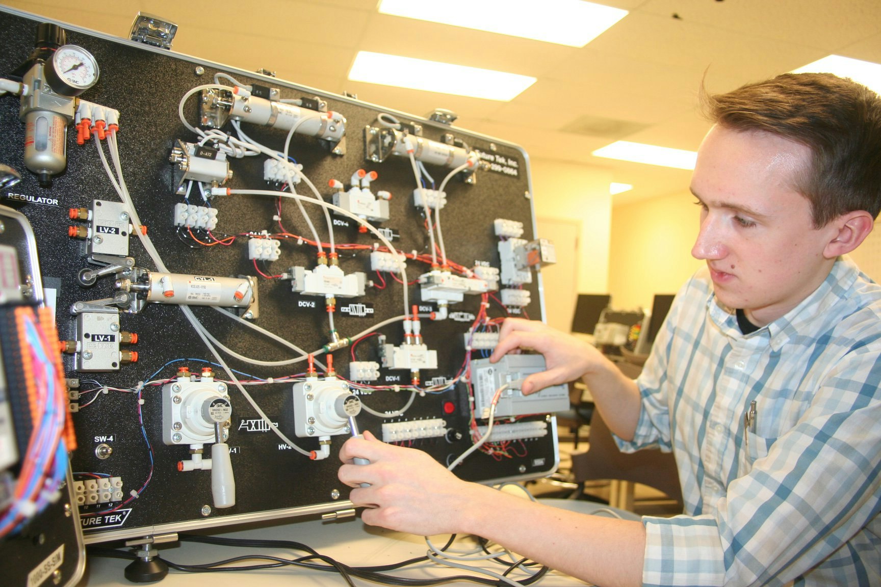 A student at Mayland Community College working on a science project