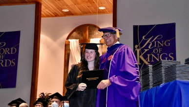 A student graduates from Mayland Community College
