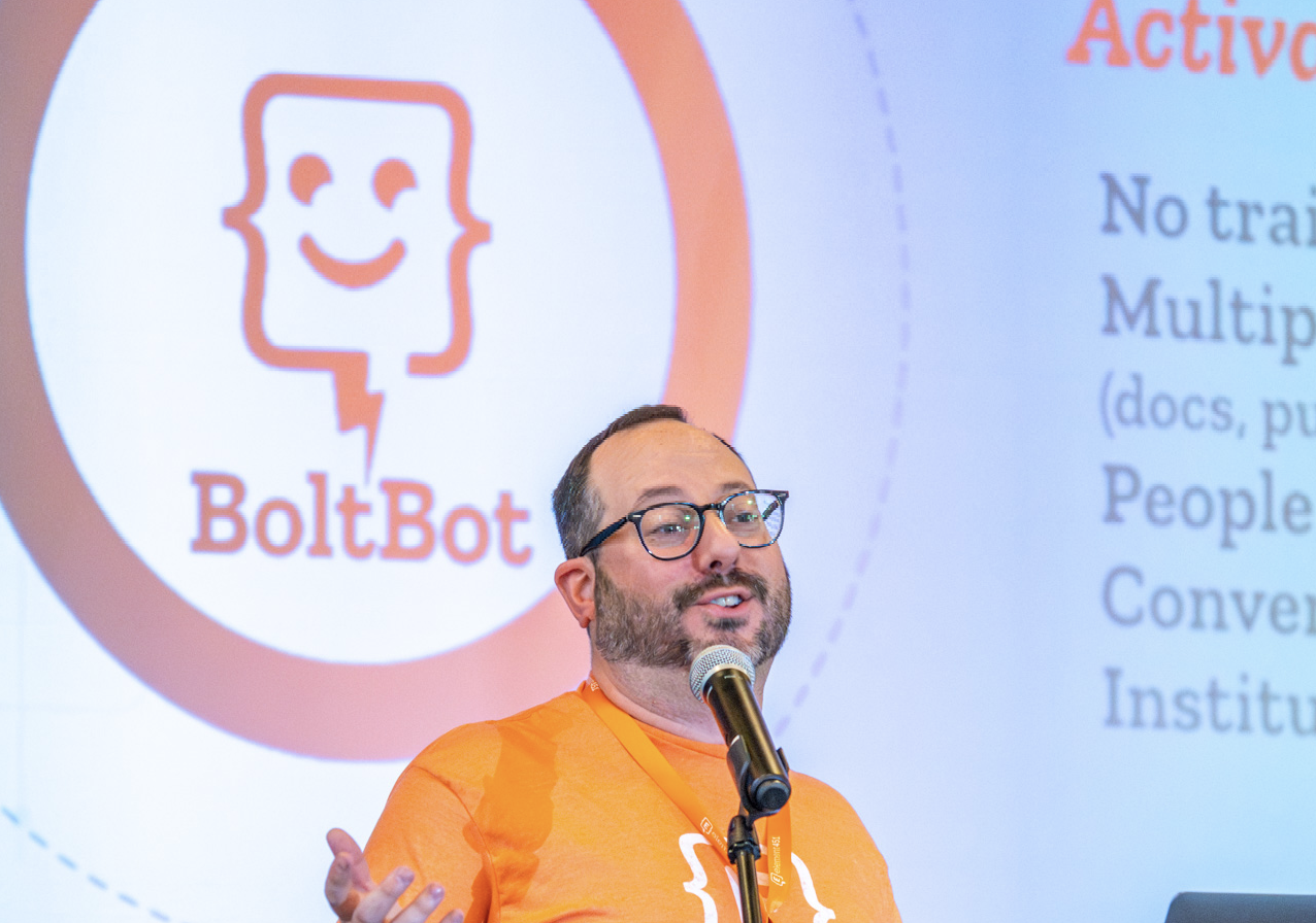 Eric Range presenting at Engage Summit about BolttBot