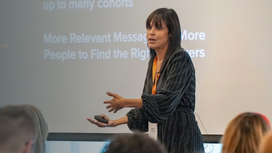 Graphic showing Wanda Pogue from VaynerMedia at Engage Summit 2022