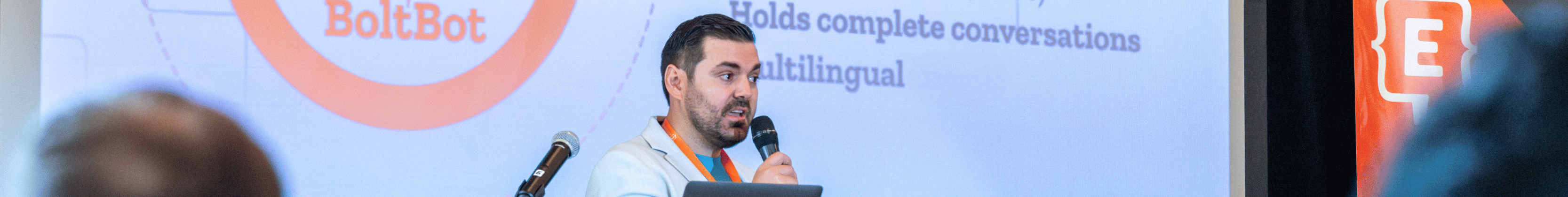Ardis Kadiu presenting on BoltBot at Engage Summit