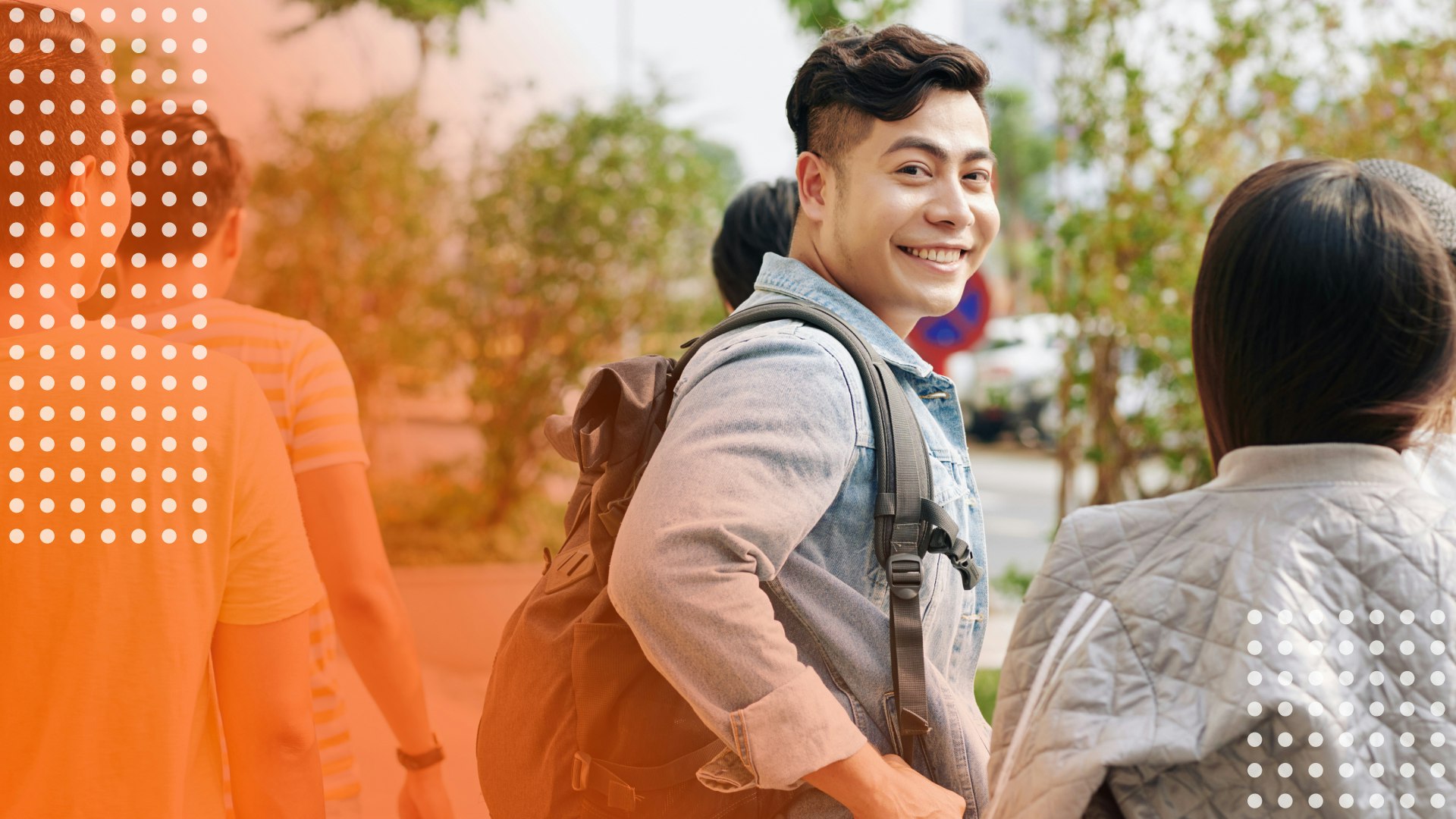 Student turning around and smiling at the camera.