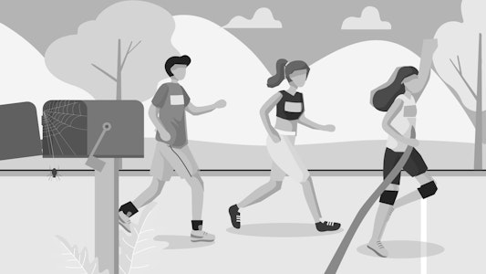 Two girls and a boy are crossing a finish line of a race.